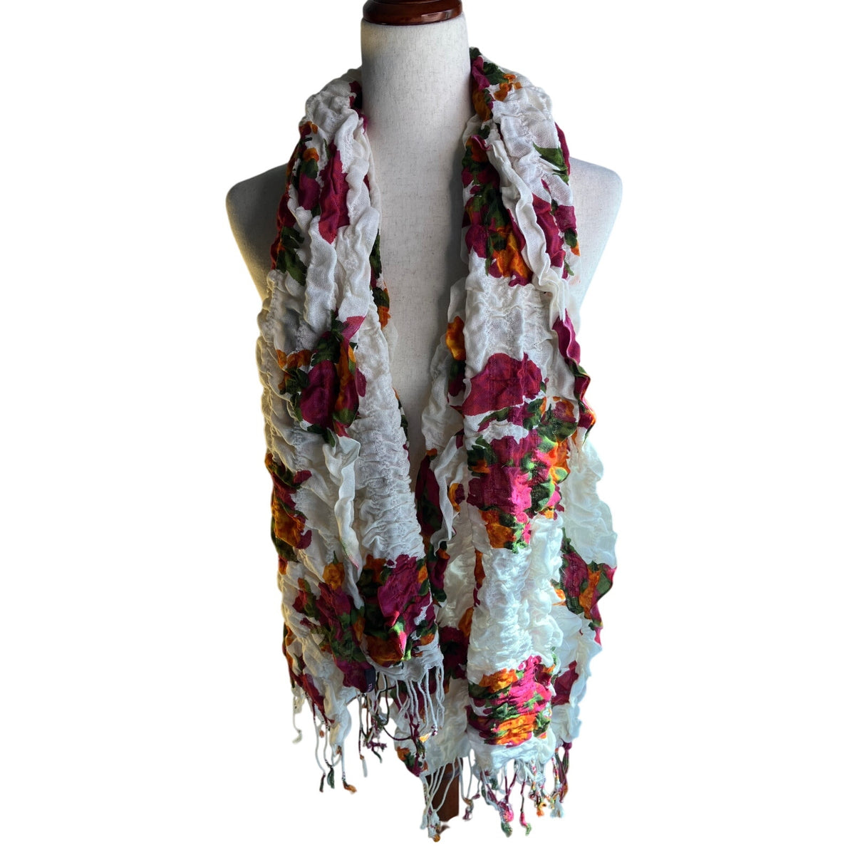Lightweight semi-sheer scarf in a soft sage/gray-green tone with a delicate multicolor floral