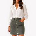 Jones New York green corduroy skirt with button front. Size: 8