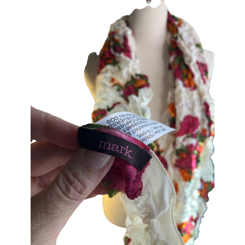 Lightweight semi-sheer scarf in a soft sage/gray-green tone with a delicate multicolor floral