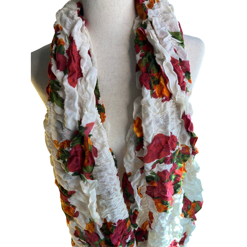 Lightweight semi-sheer scarf in a soft sage/gray-green tone with a delicate multicolor floral
